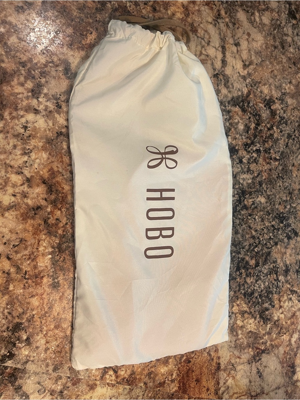HOBO Cream Drawstring Storage Pouch with Brown Logo